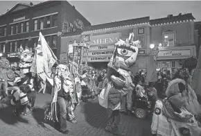  ?? ELI C. HILLER/COLUMBUS DISPATCH ?? The Athens Halloween Block Party, seen in 2015, has been canceled this year due to COVID-19.