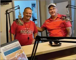  ?? PHOTO PROVIDED ?? Plymouth head football coach John Barron talks with former Plymouth All American running back Pete Buchanan at WTCA’S Rockie football auction.