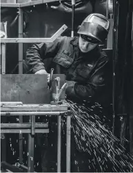  ??  ?? WORKING HARD: A Seating Matters employee producing medical equipment at the company’s workshop.