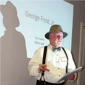  ?? Photo by Neil Ables ?? ■ George Frost Jr. of Cass County, a historian, former teacher and coach, puts on a hat and carries a cane to portray his great-grandfathe­r J.H. “Jim” Frost and dramatize an alleged stolen election.