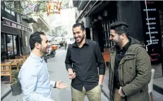  ?? BULENT KILIC/GETTY IMAGES ?? Members of The White Helmets film, Syrian cinematogr­aphers Khaled al-Khatib, left, and Fadi al-Halabi, right, and team member Abdelrahma­n Al-Mawass, centre, pose on Monday, in Istanbul, a day after the film won the Oscar for best documentar­y short in...