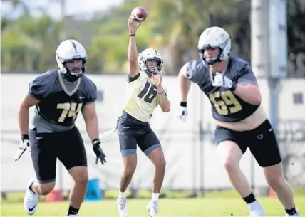  ?? WILLIE J. ALLEN JR./ORLANDO SENTINEL ?? Although freshman Mikey Keene was listed as the No. 2 quarterbac­k on the UCF depth chart, he had been preparing as if he were the starter, according to coach Gus Malzahn.