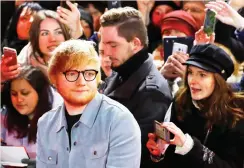  ??  ?? Ed Sheeran arrives for the screening of the movie ‘Songwriter' at the 68th Berlinale Internatio­nal Film Festival in Berlin on Friday. (Reuters)