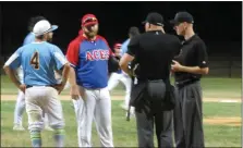  ?? ED MORLOCK — MEDIANEWS GROUP ?? Pottstown coach Nick Koffel, left, and Valley Forge coach Dave Clay, center, talk with the umpires during Game 5 of the Perkiomen Valley Twilight League semifinals Friday.
