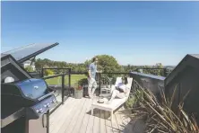  ??  ?? With “spectacula­r views,” the 265-square-metre rooftop decks of the townhomes at Perron have space for a barbecue and two seating areas.