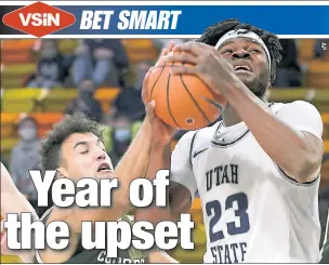  ??  ?? RIGHT ON Q: Neemias Queta goes up strong for Utah State in January. VSiN’s David Dorman writes Queta is “a name everyone will know by this weekend” and gives the Aggies a shot to beat Texas Tech on Friday and make a run in the South Region.