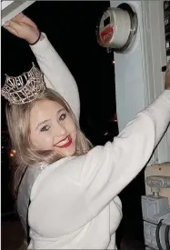  ??  ?? Miss Pea Ridge 2019 Lillian Peters flipped the switch illuminati­ng the Christmas lights in downtown Pea Ridge after the annual Christmas parade Dec. 7.