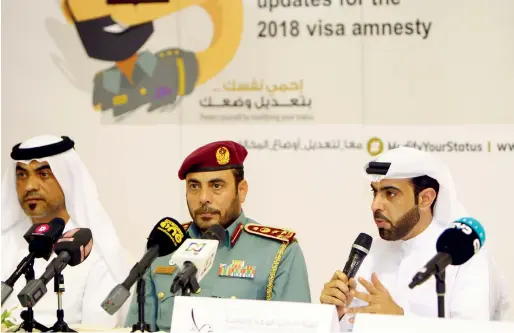  ?? Photo by Shihab ?? Brigadier-General Khalaf Ahmed Al Ghaith (right), along with Lieutenant Abdullah Khamis Al Naqbi and Brigadier Rashid Khalifa Al Falasi, assistant director-general of fire and rescue services at the Dubai Civil Defence, elaborates on the progress of the amnesty programme at Al Aweer in Dubai on Wednesday. —