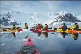  ?? PROVIDED TO CHINA DAILY ?? Tourists explore the Antarctic Peninsula in kayaks in February.