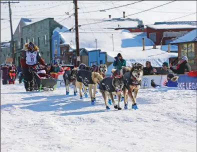  ?? Photo by Megan Gannon ?? TOP THREE— Aniak musher Richie Diehl finished the Iditarod in a career-best third place after eight days, 23 hours and 40 minutes on the trail.