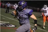  ?? The Sentinel-record/krishnan Collins ?? ■ Fountain Lake’s Abram Davis (33) carries the ball against Subiaco Academy Friday at Allen Tillery Field.