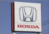  ?? KOJI SASAHARA/AP ?? THE LOGO OF HONDA MOTOR CO., is seen in Yokohama, near Tokyo on Dec. 15, 2021.