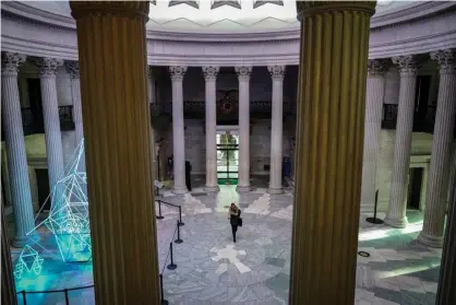  ??  ?? A National Park Service employee arrives for work at federal hall in New York City on 28 January. Photograph: Drew Angerer/Getty Images
