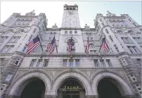  ?? JULIO CORTEZ/ASSOCIATED PRESS FILE PHOTO ?? The Trump Internatio­nal Hotel on March 4 in Washington. Former Yankees slugger Alex Rodriguez, once vilified by Donald Trump as a ‘druggie’ and ‘joke,’ is now a key part of an investment group seeking to buy the rights to his hotel.
