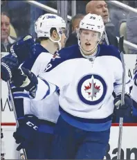  ?? Cp photo ?? Winnipeg Jets’ Patrik Laine celebrates his goal against the Pittsburgh Penguins in Pittsburgh.