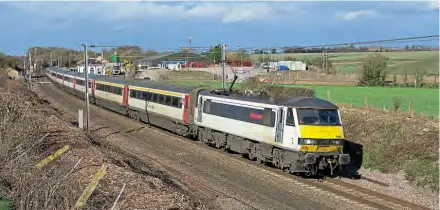  ?? Ryan Hayward ?? Get them while you can, as Greater Anglia’s current derogation to continue using loco-hauled Mk.3 stock on the Great Eastern Main Line runs out on April 1. On February 17, No. 90004 passes Haughley Junction, north of Stowmarket, with the 1P41/13.30 Norwich to Liverpool Street.