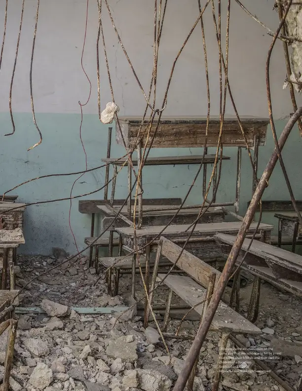  ?? ?? Children visit their classroom on the same day that the school was hit by a raid that killed their friends and deprived the children of education.
September 23, 2018
Mouneb Taim © All rights reserved