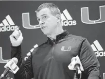  ?? LYNNE SLADKY/AP ?? Hurricanes coach Mario Cristobal speaks during a news conference on National Signing Day on Wednesday in Coral Gables. Cristobal’s 2022 recruiting class is ranked 15th in the nation and third in the ACC.