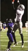  ?? Contribute­d by Gail Conner ?? Cedartown’s Zahquan Frazier goes up for a pass against the Chapel Hill defense.