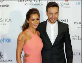  ??  ?? In this May 9, 2016, photo, Cheryl Cole and Liam Payne pose during a photo call for the Global Gift Gala at Four Seasons Hotel George V in Paris.
