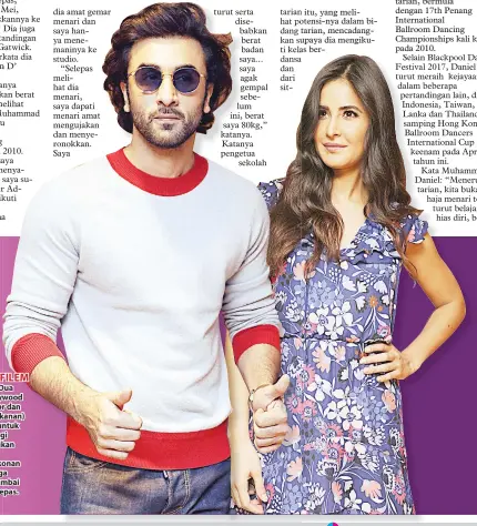  ?? — Gambar AFP ?? PROMOSI FILEM BAHARU:
Dua pelakon Bollywood Ranbir Kapoor dan Katrina Kaif (kanan) semasa tiba untuk satu acara bagi mempromosi­kan filem Hindi terbaharu lakonan mereka, ‘Jagga Jasoos’ di Mumbai pada 4 Julai lepas.