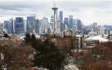  ?? Ruth Fremson / New York Times ?? UT researcher­s estimate that COVID-19 was already spreading in Seattle, an early hot spot, weeks ahead of its lockdown.