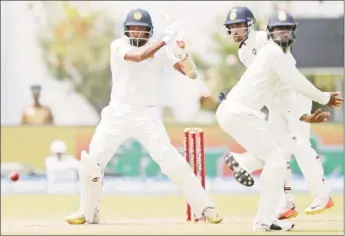  ??  ?? Sri Lanka’s Dilruwan Perera on the go during his unbeaten knock of 92. (Reuters photo).