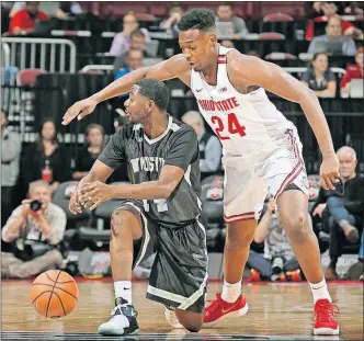  ?? [BARBARA J. PERENIC/DISPATCH] ?? Ohio State’s Andre Wesson pressures Wooster’s Simon Texidor during the exhibition game at Value City Arena.