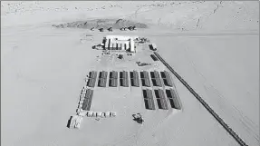  ?? XINHUA ?? An aerial photo, taken on July 11, 2018, shows the solar power plant project of the Shanghai Electric Power Constructi­on Co near Cauchari, a town in the province of Jujuy, Argentina.