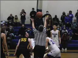  ?? ?? TIP OFF—Unalakleet and Nome-Beltz tip-off for the last game of the Subway Showdown.