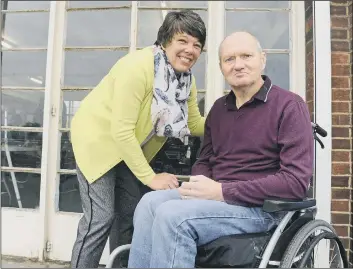  ??  ?? RESPECT Lorraine Pratt with her husband Kevin who contracted viral encephalit­is