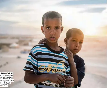  ??  ?? STRUGGLE Children play in a Sahrawi refugee camp in Tindouf, Algeria