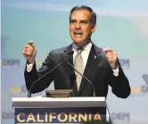  ?? Denis Poroy / Associated Press ?? Los Angeles Mayor Eric Garcetti, top, San Francisco activist Tom Steyer and Sen. Kamala Harris made speeches at the California Democratic Party convention in San Diego that they could be repeating next year in Iowa.