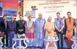  ?? HT ?? ▪ Chief minister Yogi Adityanath with film producers and actors in Lucknow on Saturday.