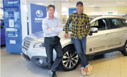  ??  ?? Mark James of James & Jenkins with Richard Parks and his new Outback