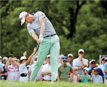  ?? [AP PHOTO] ?? Justin Thomas hits from the 12th tee during the final round of the PGA Championsh­ip on Sunday at Bellerive Country Club in St. Louis.