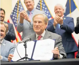  ?? Photo / AP ?? The bill Governor Greg Abbott signed underlined the hard-right turn Texas Republican­s made this year.