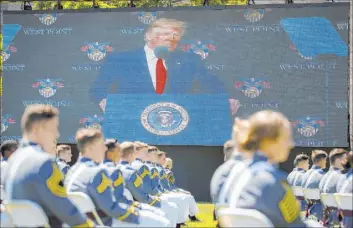  ?? John Minchillo The Associated Press ?? President Donald Trump speaks at U.S. Military Academy commenceme­nt ceremonies Saturday in West Point, N.Y. Trump’s commenceme­nt speech to the 1,100 graduating cadets comes amid racial tensions and a global pandemic.