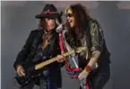  ?? JIM DAVIS/GLOBE STAFF ?? Joe Perry (left) and Steven Tyler of Aerosmith at Fenway in 2022.