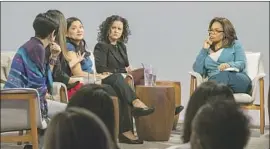  ?? Karen Ballard ?? JEANINE CUMMINS faces Latina authors, left, and Oprah Winfrey.