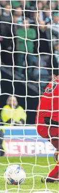  ?? PA. Pictures: ?? Above: Moussa Dembele watches as his flick goes through the legs of Rangers keeper Matt Gilks for the only goal of the game; below: Celtic’s Tom Rogic challenges Kenny Miller.