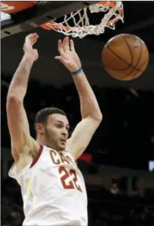  ?? TONY DEJAK — THE ASSOCIATED PRESS ?? Cleveland’s Larry Nance Jr. dunks against the first half of a game Monday night. the Pistons in