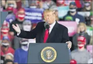  ?? CHARLIE NEIBERGALL — THE ASSOCIATED PRESS ?? President Donald Trump speaks at a campaign rally at Des Moines Internatio­nal Airport on Wednesday in Des Moines, Iowa.
