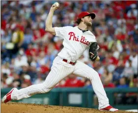  ?? MATT SLOCUM — THE ASSOCIATED PRESS ?? The Phillies’ Aaron Nola pitches during the fourth inning on Saturday.