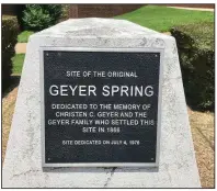  ?? Arkansas Democrat-Gazette/RACHEL HERZOG ?? A plaque dedicated in 1976 at 5615 Geyer Springs Road in Little Rock marks the site of the “original Geyer Spring.” A member of Geyer Springs Methodist Church said he thinks the spring could be the source of water struck recently during a constructi­on project.