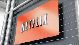  ?? Ryan Anson AFP/Getty Images ?? NETFLIX attracted 4.95 million new subscriber­s in the first quarter; it had forecasted 5.2 million. Above, a sign at the company’s headquarte­rs in Los Gatos, Calif.