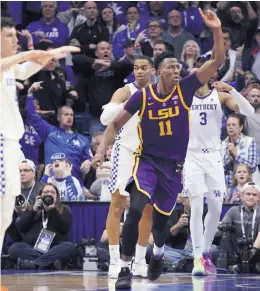  ?? JAMES CRISP/ASSOCIATED PRESS ?? LSU’s Kavell Bigby-Williams (11) celebrates after tipping in the game-winning shot against Kentucky Tuesday.