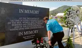  ?? —JOEY GABIETA ?? TRIBUTE Tacloban City Mayor Alfred Romualdez leads the inaugurati­on of a memorial park inside the mass grave where more than 2,200 people were buried after Supertypho­on “Yolanda” struck in 2013.