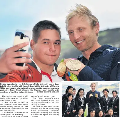  ?? PHOTOS: CHRISTINE O’CONNOR ?? Golden opportunit­y . . . St Petersburg State University rower Egor Lubskii takes a selfie with Hamish Bond at the University of Otago’s 150th anniversar­y internatio­nal rowing regatta opening ceremony yesterday. Inset: Bond displays his Olympic gold medals with members of the Keio University team.