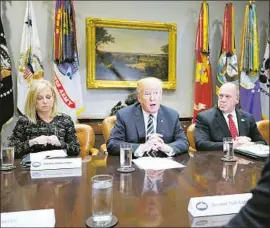  ?? Mandel Ngan AFP/Getty Images ?? PRESIDENT TRUMP discusses “sanctuary cities” at a White House meeting. He has been feeding his political base by assailing California.
